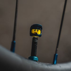Brick Caps: Tyre Valve Dust Caps made from LEGO® Heads || female w/full face helm || for bike, car, scooter, wheelchair, bicycle, motorbike