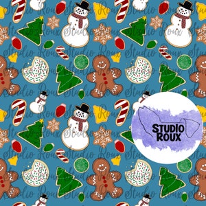 May include: A seamless pattern featuring gingerbread men, snowmen, Christmas trees, and candy canes on a blue background. The pattern is repeated throughout the image. The text "Studio Roux" is visible in the center of the image.
