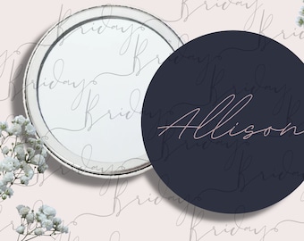 May include: Two round, white labels with a silver border. The label on the left is blank. The label on the right is dark blue with the name "Allison" written in pink cursive.