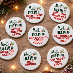May include: Eight round white buttons featuring green and red text with holiday phrases including Most Likely To Regift Their Present, Get Their Tinsel In A Tangle, Be The First To Leave, Ask Santa To Define Good, Get More Lit Than The Tree, Steal The Sleigh, Be A Grinch, and Get Sassy With Santa.