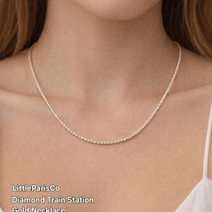 May include: A set of three ceramic mugs with a speckled, matte finish. The mugs are in shades of cream, light gray, and dark gray. Each mug has a simple, minimalist design, perfect for coffee or tea.