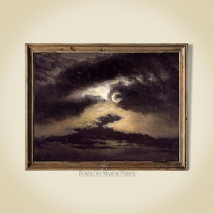 May include: A framed painting of a dark, stormy night sky with a crescent moon and clouds illuminated by moonlight. The painting is in a gold frame.