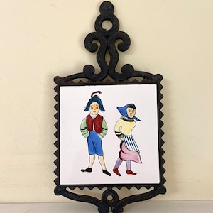 Vintage Folk Cast Iron and Ceramic Trivet