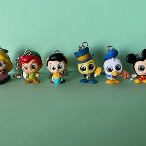 Escapada de diversión - Disney Doorable Llaveros