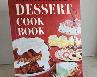 May include: A vintage "Better Homes & Gardens Dessert Cook Book" with a red cover. The cover features images of various desserts, including a strawberry shortcake and cookies. The book promises "All-time favorites plus exciting new desserts - over 400 recipes."