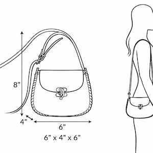 May include: Line drawing of a small, saddle-style bag with a long strap. The bag is 15 cm x 10 cm x 15 cm and the strap is 20 cm long. A woman's silhouette shows how the bag is worn. The bag has a decorative clasp.