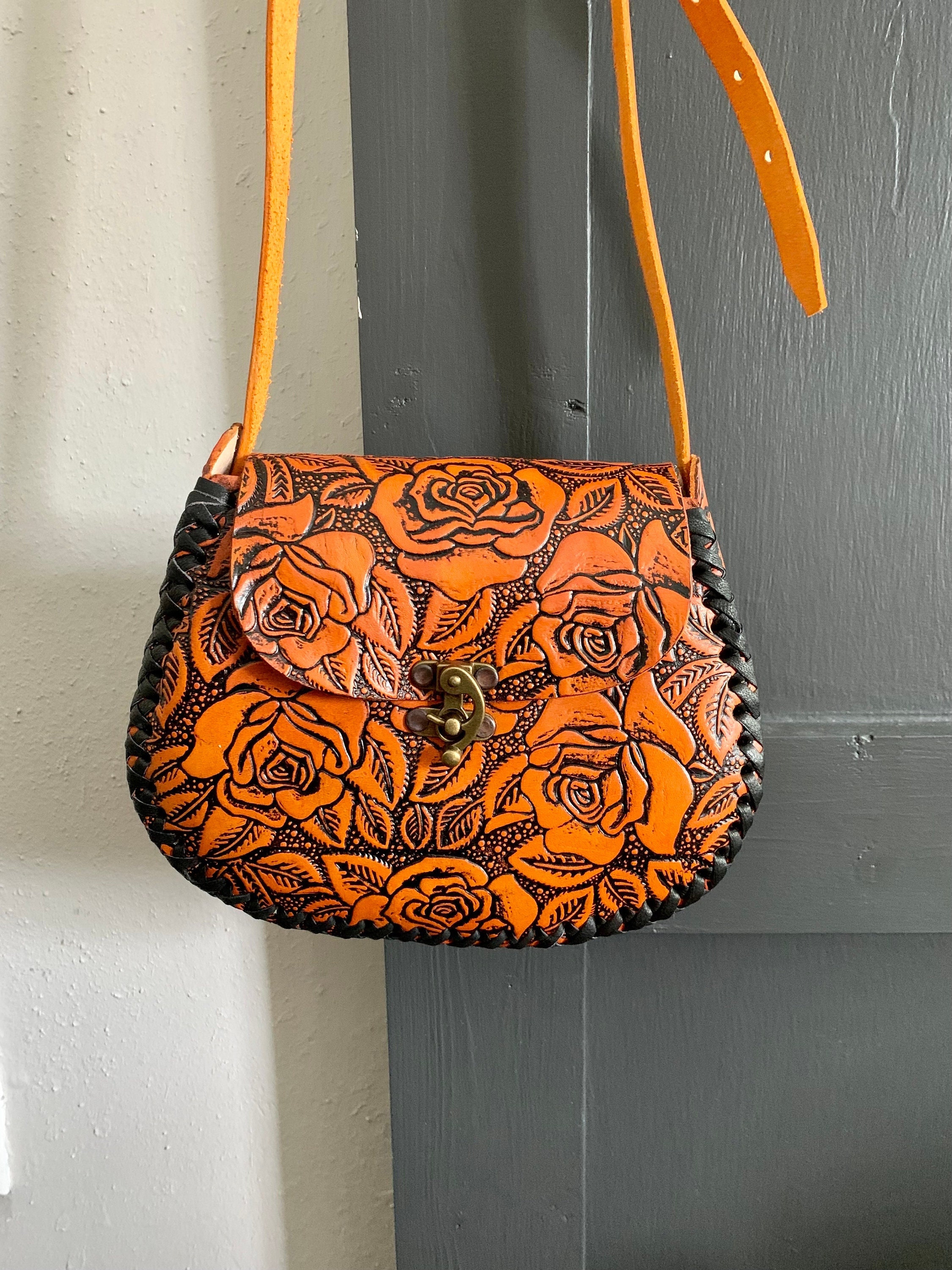 Premium Photo | Backpacks purses and handbags made with typical mexican  fabrics hanging outside souvenir stores