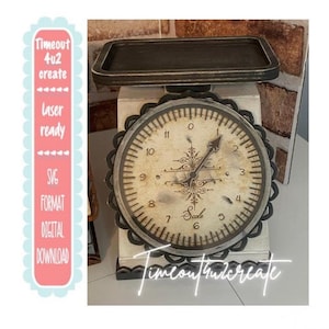 May include: A decorative scale with a distressed clock face design. The scale has a black tray and a white base. The clock face features the text "Scale" and the numbers 1 through 11. The image also includes the text "Timeout 4u2 create" and "Laser ready".
