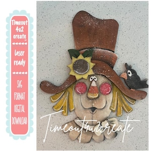 May include: A wooden scarecrow cutout featuring a tall brown hat with a yellow sunflower, red cheeks, a candy corn nose, and a black bird perched on the brim. The design includes text reading Timeout 4u2 create laser ready SVG FORMAT DIGITAL DOWNLOAD.