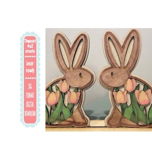 bunnies and tulips glowforge svg file. This has two bunnies and a stand to set on your table. The bunnies can be painted many different ways