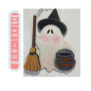 May include: A wooden Halloween ghost decoration with a black witch hat, holding a broom and a cauldron that says "Oh Sheet, It's Halloween". The ghost has pink cheeks and a smiling face. The image also includes text that says "Timeout 4u2 create laser ready SVG format digital download".