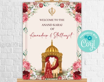 May include: A wedding welcome sign on an easel. The sign features floral accents and the text "Welcome to the Anand Karaj of Amandeep & Stallionjit." The sign also includes a gold illustration of a temple and a couple.