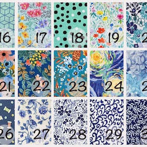 May include: A collection of 15 fabric swatches with various patterns and colors, including blue, green, white, and pink. The swatches are numbered 16 through 30.