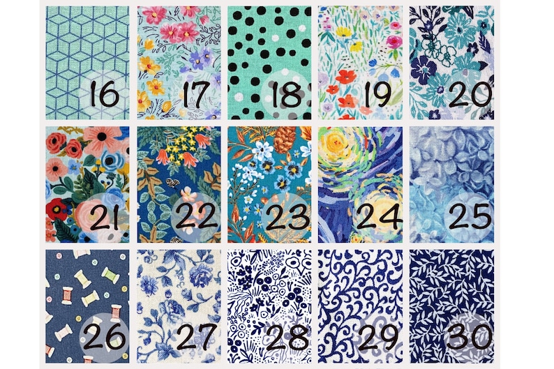 May include: A collection of 15 fabric swatches with various patterns and colors, including blue, green, white, and pink. The swatches are numbered 16 through 30.