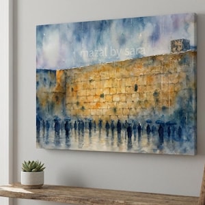 May include: Watercolor painting of the Western Wall in Jerusalem, featuring a warm-toned stone wall under a rainy sky. Silhouetted figures with umbrellas are in the foreground. The text "mazal by sara" is visible on the artwork.