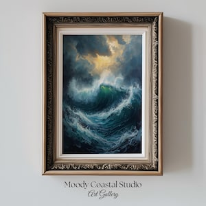 May include: A framed art print depicts a dramatic ocean wave under a stormy sky. The artwork features shades of teal, blue, and green, with a golden light breaking through the clouds. The frame is ornate with a gold finish. Text at the bottom reads "Moody Coastal Studio Art Gallery."