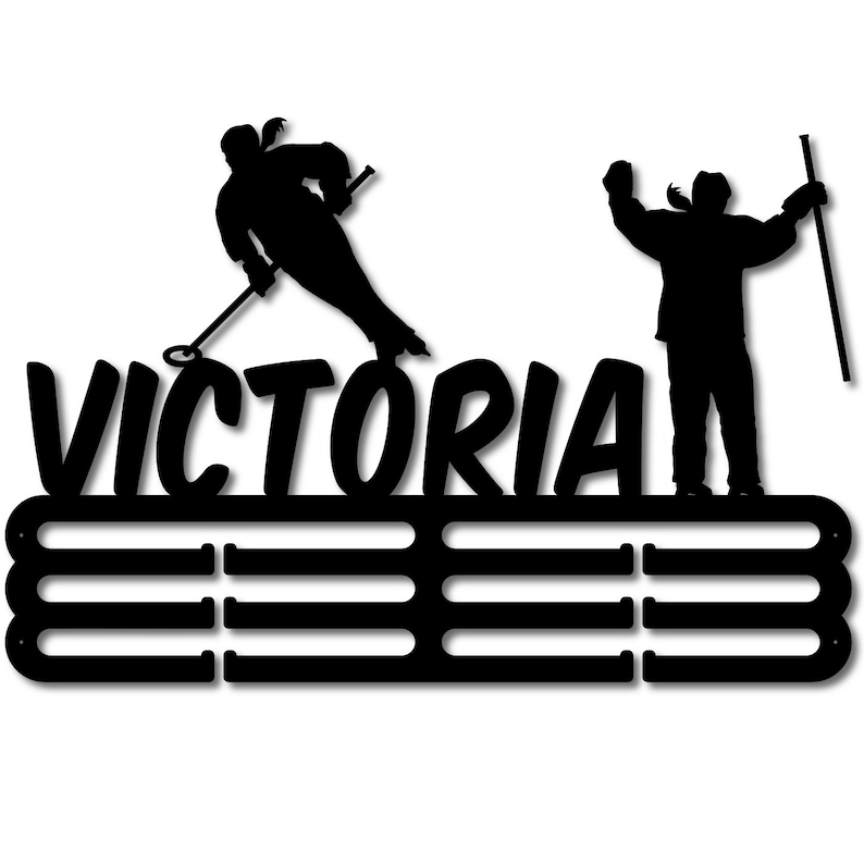 May include: Black metal medal display featuring the name "VICTORIA" and hockey player silhouettes. The design includes multiple slots for displaying medals, ideal for showcasing sporting achievements. A great gift for hockey fans.