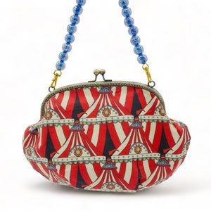 Roll up roll up circus themed handbag