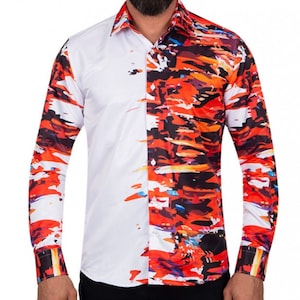 May include: A white long-sleeved shirt with an abstract print in shades of orange, red, black, and blue. The print covers one half of the shirt.