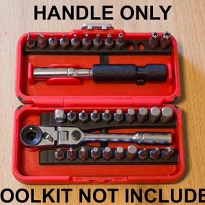May include: A red plastic storage case containing a variety of metal screwdriver bits and two metal handles. The case features the text HANDLE ONLY at the top and TOOLKIT NOT INCLUDED at the bottom, indicating the case is sold without the tools.