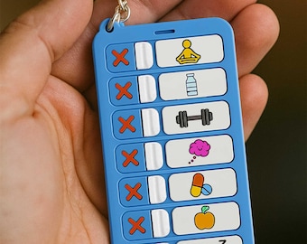 May include: A blue keychain with a series of white rectangles featuring icons representing wellness activities. The icons include a person in a yoga pose, a water bottle, a dumbbell, a brain, pills, an apple, and a sleeping banana.