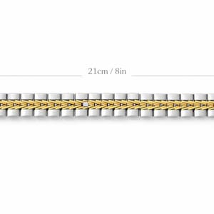 May include: A two-tone bracelet, 21cm (8in) long, featuring silver-coloured metal with gold-coloured accents. The bracelet has a repeating pattern of rectangular and triangular links. The image is on a white background.