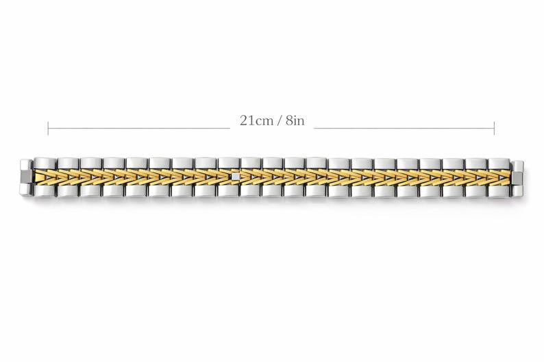 May include: A two-tone bracelet, 21cm (8in) long, featuring silver-coloured metal with gold-coloured accents. The bracelet has a repeating pattern of rectangular and triangular links. The image is on a white background.