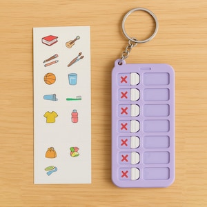 May include: A purple checklist with 8 white squares and red X marks. Each square has a white border. The checklist is attached to a silver key ring.