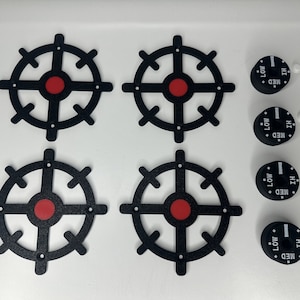 May include: Four black stovetop burner knobs with red centres and white text that reads "HI", "MED", and "LOW".