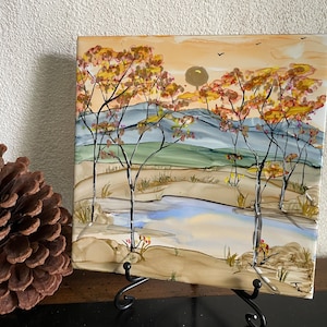 Large 6x6 Ceramic Tile Hand Painted With Alcohol Ink and epoxy resin coated. “Golden leaves of Autumn”.