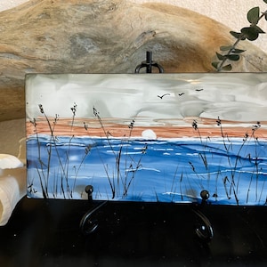 Alcohol Ink hand painted on 3x6” ceramic tile. “Where the crawdads sing” Epoxy coated. Table top or wall art. Great gift.
