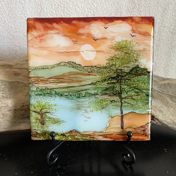 Lazy  Lake under Setting Sun, 4x4 Ceramic Tile Hand Painted with Alcohol Ink. Epoxy Resined , Rusty clouds over country landscape