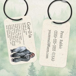 May include: A white ceramic mug with a black handle and the text "But First, Coffee" in a bold, black font. The mug is set against a neutral background, highlighting its simple design.