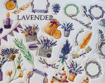 May include: A set of watercolor stickers featuring lavender flowers, wreaths, candles, and other floral designs. The stickers are perfect for adding a touch of whimsy to journals, planners, and other craft projects. The stickers feature the word "Lavender" in a handwritten font.