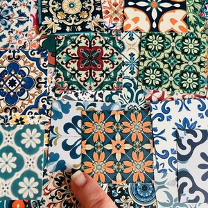 May include: Assortment of colorful patterned ceramic tiles with intricate designs. The tiles feature a variety of colors, including blue, green, red, yellow, and white. The tiles are arranged in a random pattern, creating a visually appealing and eclectic design.