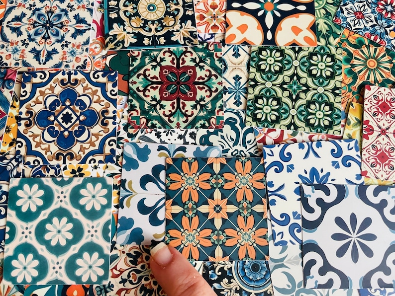 May include: Assortment of colorful patterned ceramic tiles with intricate designs. The tiles feature a variety of colors, including blue, green, red, yellow, and white. The tiles are arranged in a random pattern, creating a visually appealing and eclectic design.