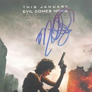 Milla Jovovich Signed 8x10 Photo - Beckett BAS Authentic Autograph