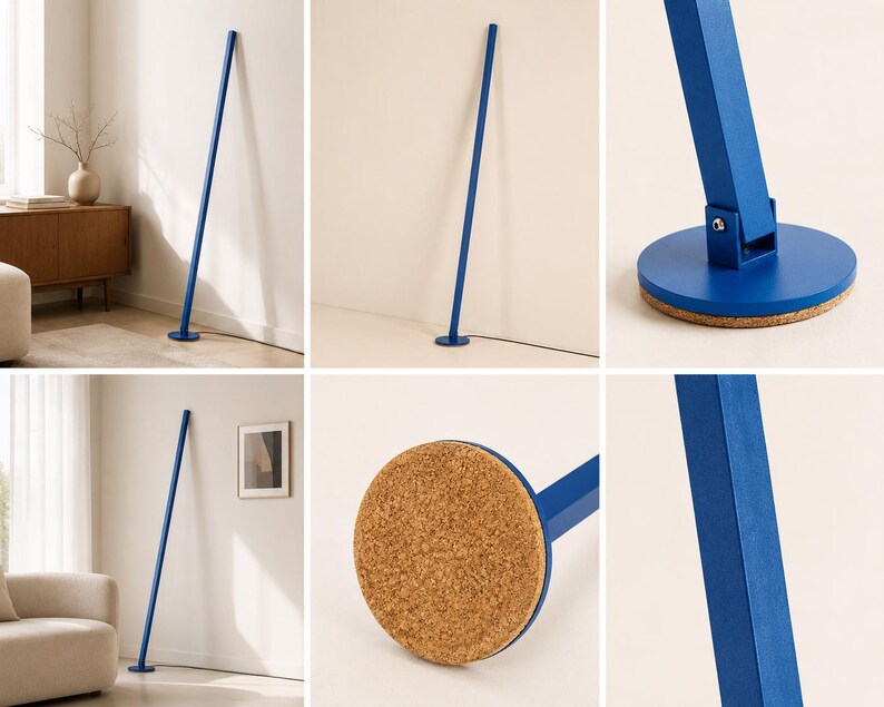 Puede incluir: L&aacute;mpara de pie moderna y minimalista en un vibrante color azul. La l&aacute;mpara presenta un poste delgado y rectangular que se extiende hacia arriba desde una base circular. La base tiene una parte inferior de corcho. La l&aacute;mpara est&aacute; dise&ntilde;ada para apoyarse contra una pared.