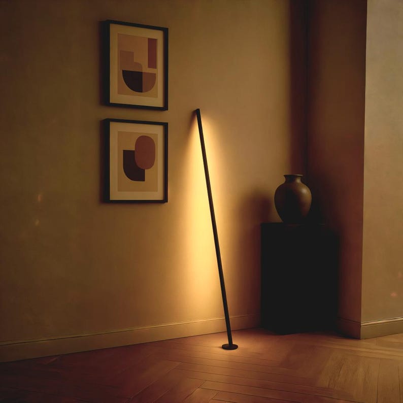Gica Contra handmade minimalist floor lamp by Tommaso Cristofaro — vertical sculptural light in aluminum with indirect warm glow, modern Italian design, unique signed and numbered piece.