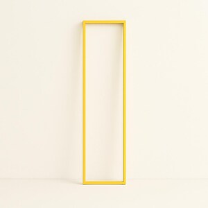 Sunny yellow minimalist frame for Italian-designed floor lamp. Ideal for adding color to Scandinavian or artistic interiors.