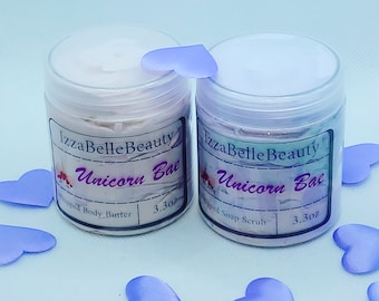 May include: Two jars of body care products labeled "Izza Belle Beauty Unicorn Bae". One jar is a whipped body butter and the other is a whipped soap scrub. Both jars are 3.3 oz.