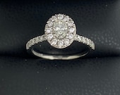 Natural diamond oval cut halo diamond brilliant cut shoulders engagement ring 18ct white gold