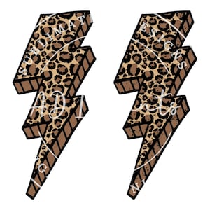 May include: Two brown and black lightning bolt shaped designs with a leopard print pattern.