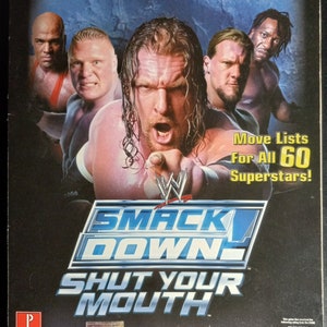 Vintage PS2 WWE Smack Down Game Play Book