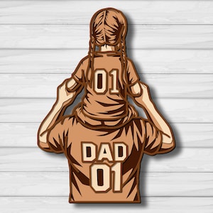 May include: A brown illustration of a person carrying a child on their shoulders. The child and adult are wearing matching shirts with the numbers "01" and the word "DAD" printed on them. The background is a white wooden plank design.