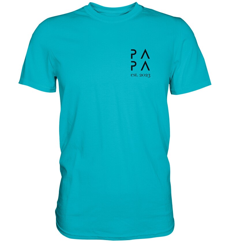 May include: A turquoise blue t-shirt with a black logo that says "PA PA" and "est. 2023".