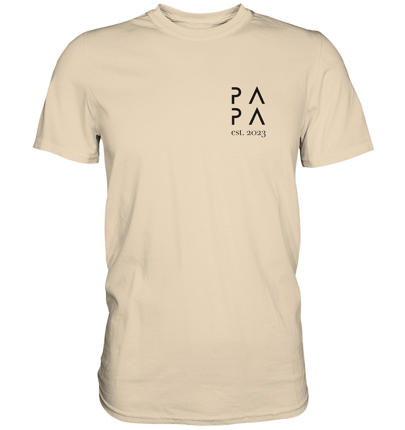 May include: A beige t-shirt with a black graphic design that says "P&Lambda;P&Lambda; est. 2023".