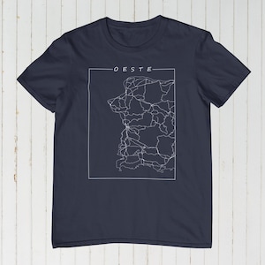 May include: A navy blue t-shirt featuring a white outline of a map and the word "OESTE" printed on the front.