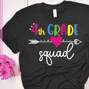 May include: Black t-shirt with the text "4th GRADE squad" in colorful letters. A pink heart with an arrow and a heart shape at the end is above the text.