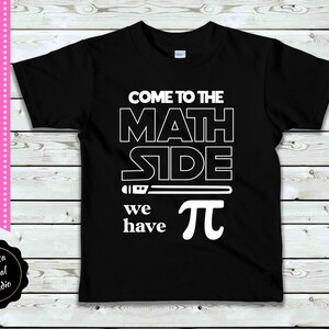May include: Black t-shirt with white text that reads "Come to the Math Side we have π".